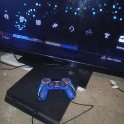Playstation 4 with grip added controller