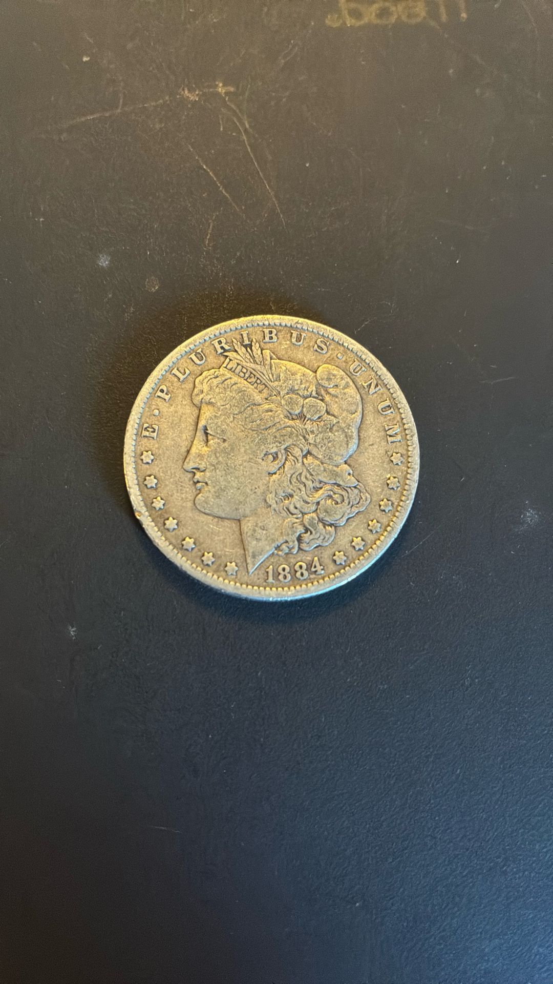 1884 O Morgan Silver Dollar