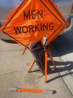 Men Working Roll-Up Construction Sign with Stand