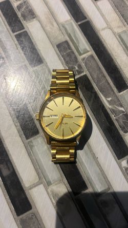 Gold Nixon Watch
