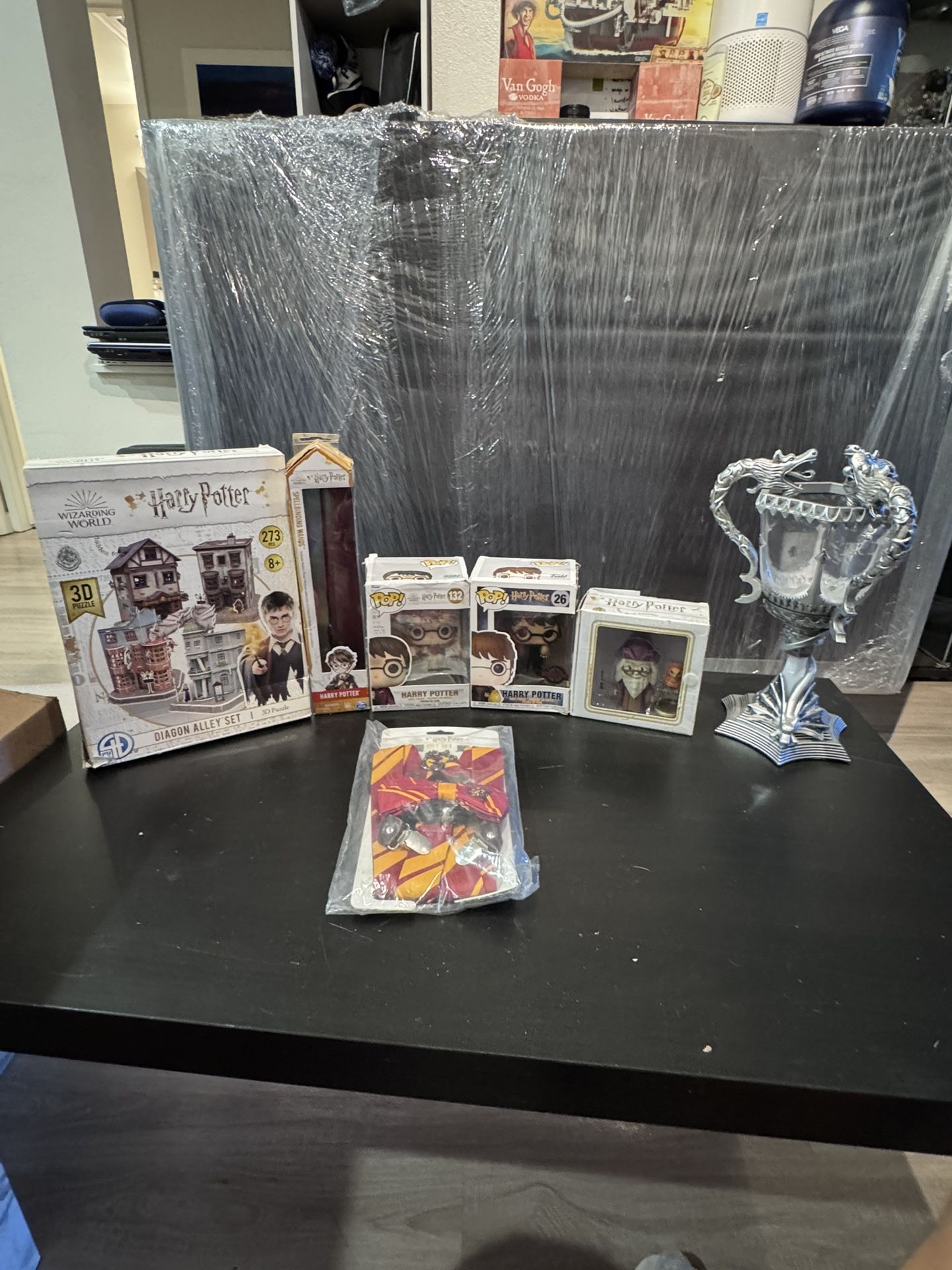 Harry Potter Collectible Lot – Wand, Triwizard Cup, Funko Pops, Diagon Alley 3D Puzzle & Gryffindor Gift Set 