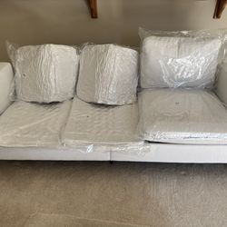 Set of brand new  3 seat sofa assembled