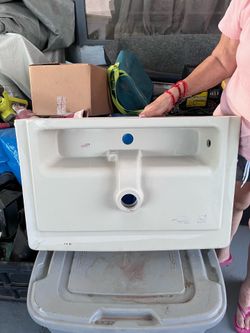 White sink with parts