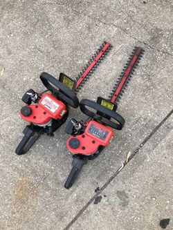 Two Homelite gas hedge trimmer’s