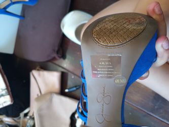 Elevate your style with these stunning Jessica Simpson platform sandals in ultra blue.