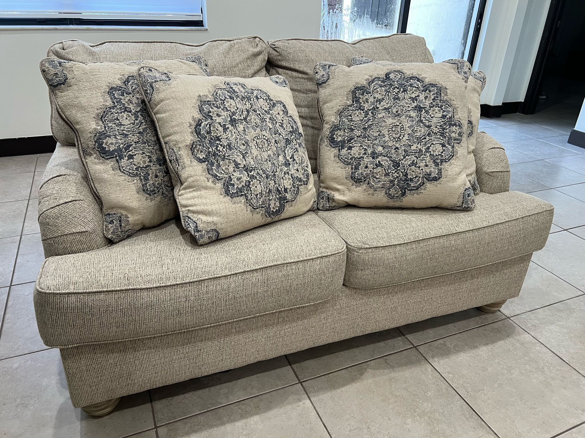 Beige Two-Seater Couch with Decorative Pillows - Gently Used