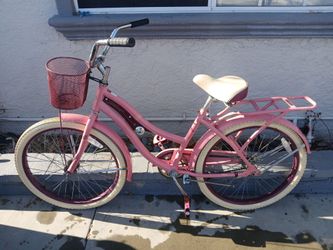 Women's 24" pink Huffy Beach Cruiser