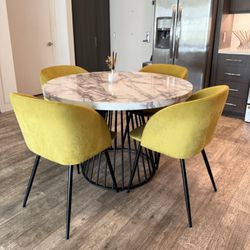 Marbel Table with yellow Chairs 