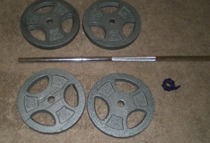 Weights 217 lbs with bar and clamps & 8 25 lb plates New ConditionÂ