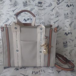 It's a stylish accessory that complements any modern woman's look.