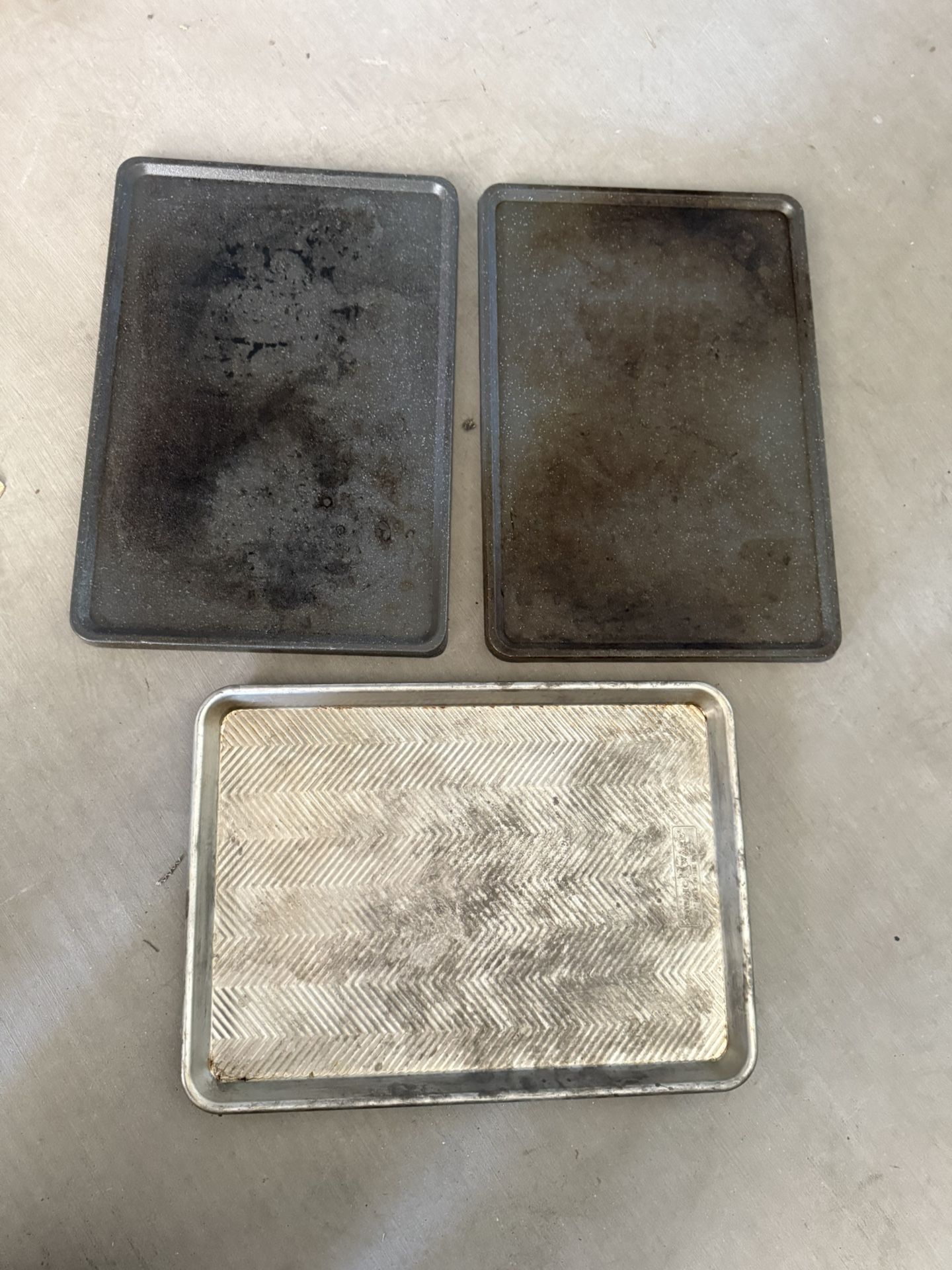 2 Griddle Pans And A Baking Sheet