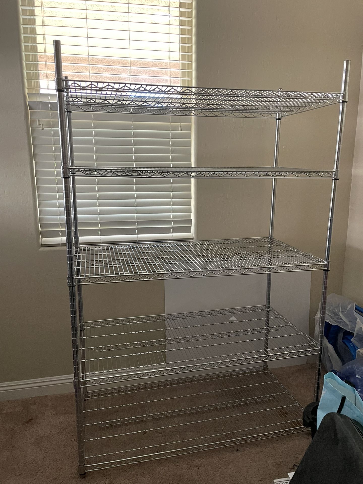 🦖 Heavy-Duty Metal Storage Rack – 48”W x 24”D x 72”H 🦕 📍 Pickup Location: S. Durango & 215 near IKEA Features: • 5-tier chrome wire shelving uni