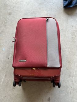19x8 inch Travelsmith red suitcase