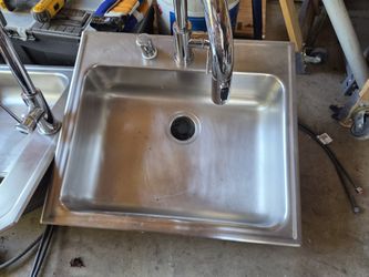 Sink And Commercial Grade Faucet
