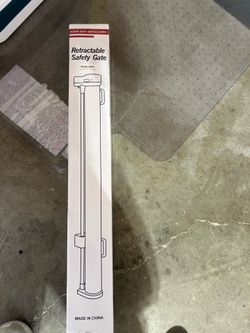 Retractable safety gate