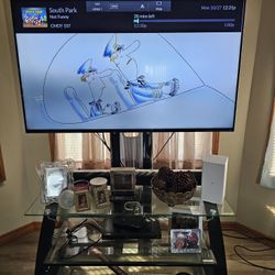 42 Inch TV with Glass Stand Sound Bar And Blu-ray Player