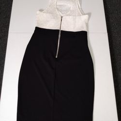 Premier Amour Women Midi Dress Sz 12 sweetheart pencil new with tags ivory black Sleeveless

New never used with no visible stains or defects

I love 