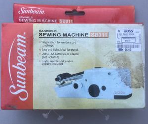 Handheld sewing machine