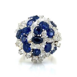 Designs Sapphire & Diamond Cluster 💎🤙🏾❤️ 18K yellow and white gold sapphire and diamond cluster ring. Set with 15 high quality oval sapphires with 