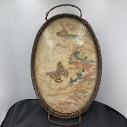 The Antique Wicker Serving Tray with Dried Butterflies and Flowers (p302)