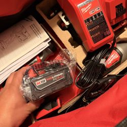 Milwaukee Battery & Charger $100