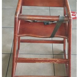 Brown Wooden High chair. 