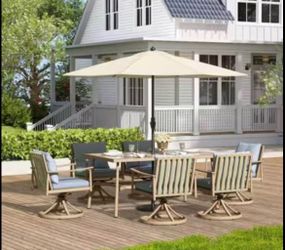 Sunset Retreat 7-Piece Aluminum Outdoor Dining Set with Swivel Chairs and Blue Cushions