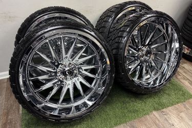 New 26x12 chrome tis wheels wrapped in 305/30r26 tires SAME AS A 33 