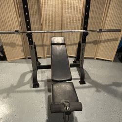 Gold Gym Bench With Weightlifting Bar Bell