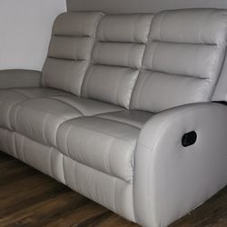 Kanes Beautiful Couch And Easy To Wipe -sides Are Recliners