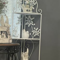 Corner Shelve And Two White Towers.