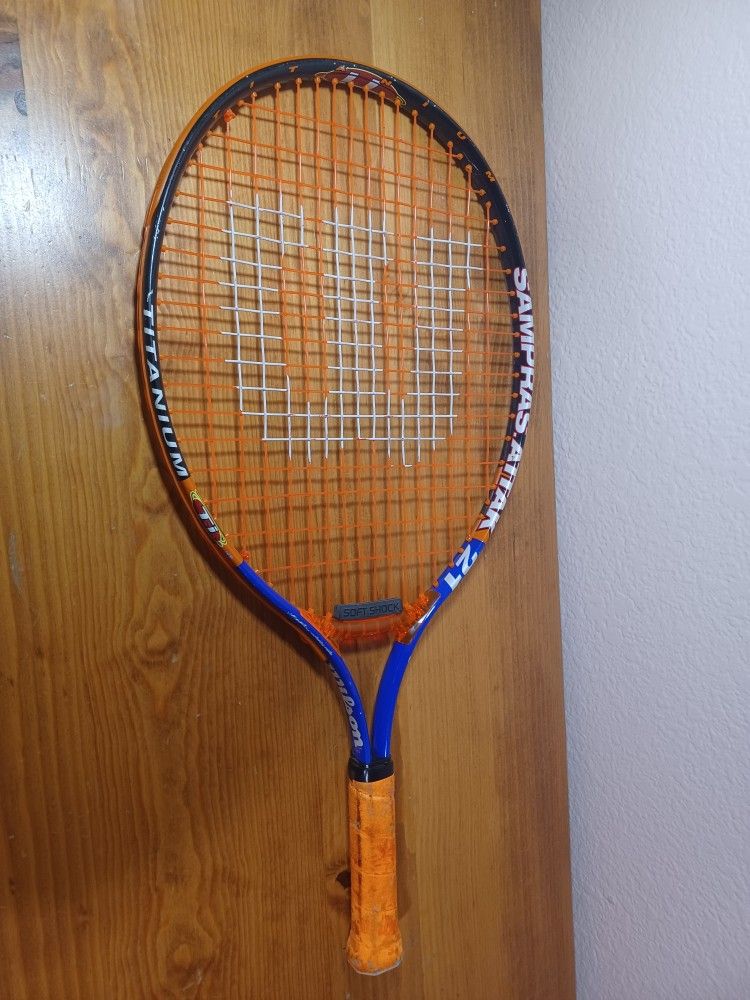 4 Tennis Racquets (Mostly Wilson)