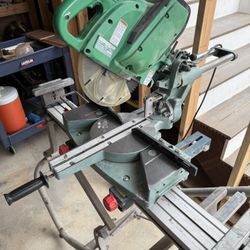 Hitachi 10” Sliding Compound Miter Saw And Rolling Stand