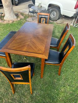 Table with chairs and bench