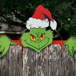 grinch over the fence 