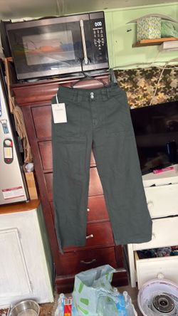 LOWERED AGAIN.      Woman’s size. M-L green flared pants