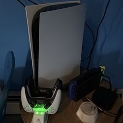 Ps5 with headphones and 2 controllers