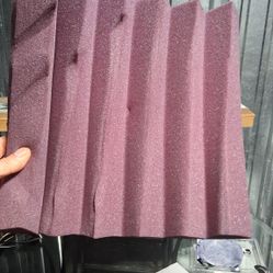 two contractor bags full of acoustic foam panels