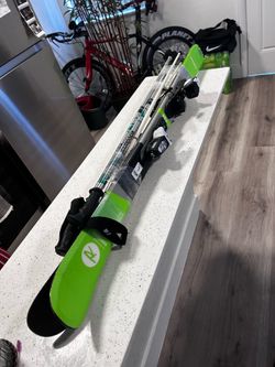 Rossignol skis with ski poles and bindings size L
