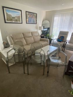 3 Clear Chairs