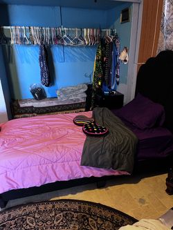 Twin bed with sheets and comforter