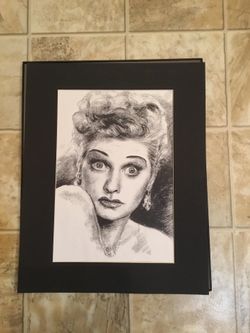 Lucille Ball print in very good condition. 11” x 15” .... with black matte 16” x 20”