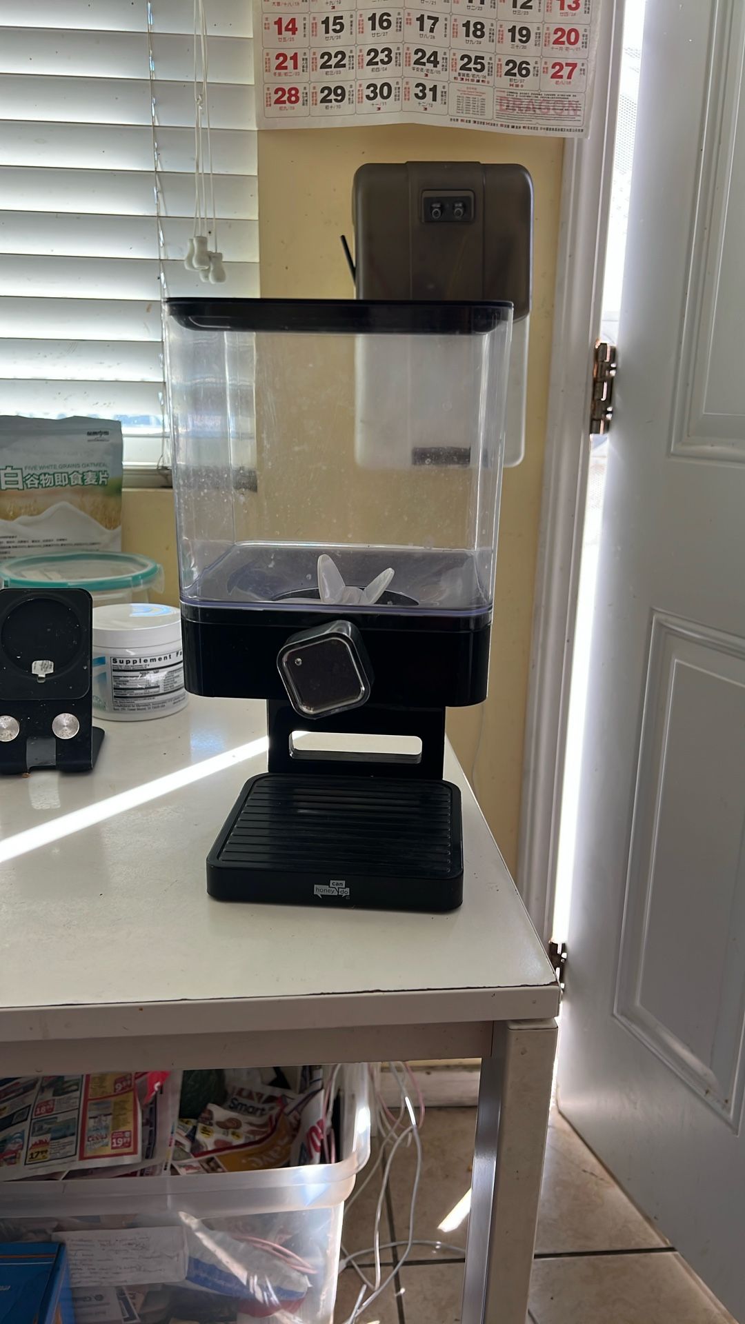 Grain dispensing containers