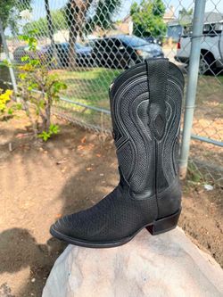 Bota vaquera de piel para hombre