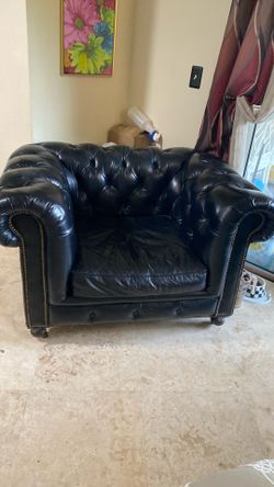 Two leather arm chairs