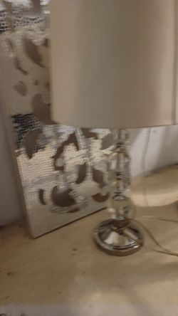 Glass Ball Lamp With White Shade And Mirror Wall Art