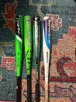 4 baseball bats. Aluminum + 1 wooden. Barely used, in excellent condition, made of aluminum, sizes 29/27/30/26 inches. I'm not selling them separately