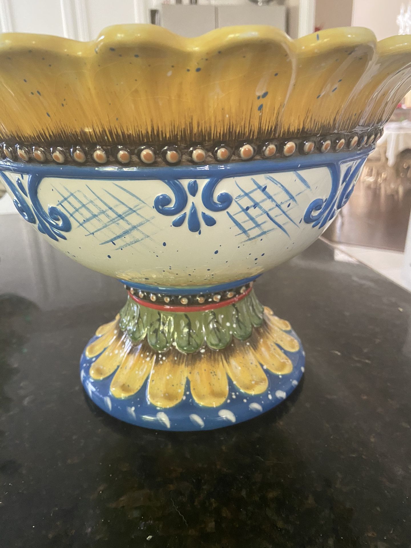 Sunflower salad bowl with serving spoons