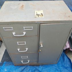 Vintage old file cabinet with safe combination.