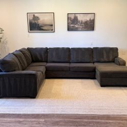Ashley furniture dark gray sectional couch delivery available